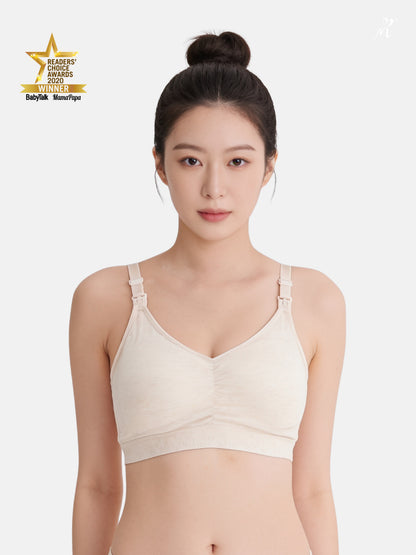 mama daily comfort nursing bra in light beige on model
