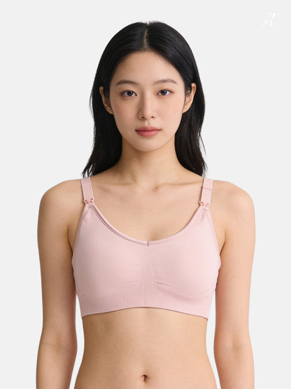 Bmama wireless support nursing bra in pastel pink showing supportive molded cups