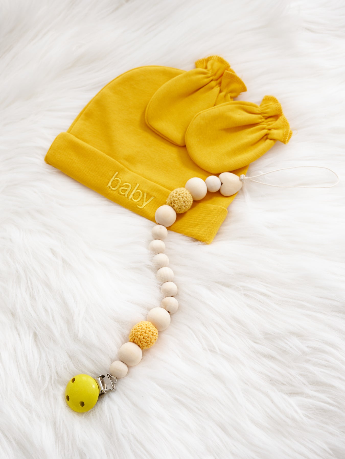 Adjustable pacifier clips