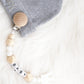 Adjustable pacifier clips