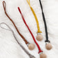 Pacifier clips with leather suede braid
