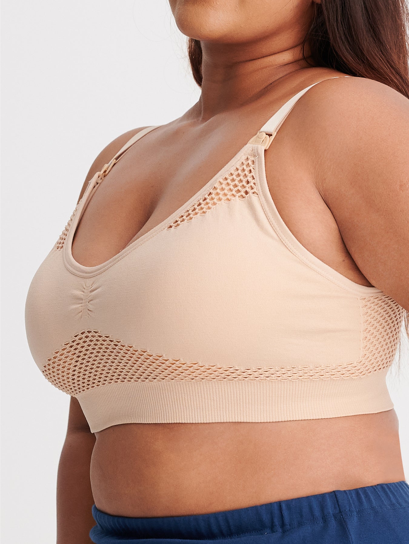 Beige Sports bra with built-in pumping system