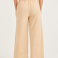 Trendy and fashionable milky beige pants
