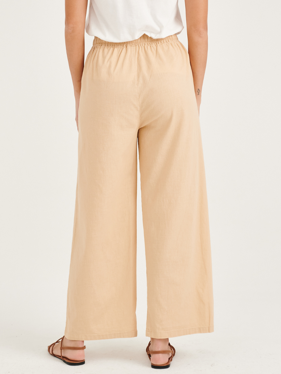 Trendy and fashionable milky beige pants